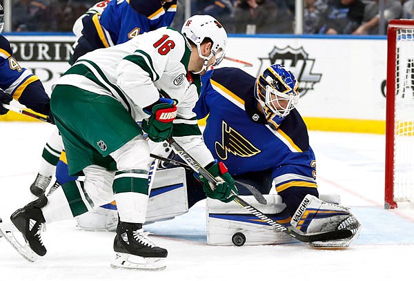 Jason Zucker of the Wild is unable to score past Blues goaltender Chad Johnson during the third period of Sunday's game in St. Louis.