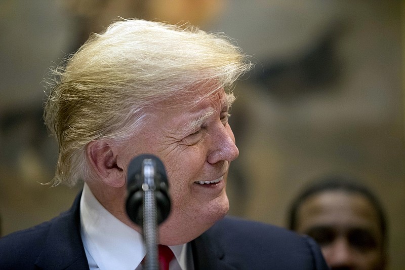 President Donald Trump smiles as he speaks about H. R. 5682, the "First Step Act" in the Roosevelt Room of the White House in Washington, Wednesday, Nov. 14, 2018, which would reform America's prison system. (AP Photo/Andrew Harnik)