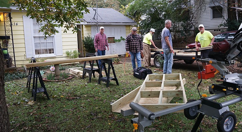 These ramp builders are getting themselves poised to build a ramp in Atlanta. From left, they are Gary Grogan, Jim Moulton, Roger Geiger, Mike Simon and Pete Schroeder, all from Eagle Landing.
