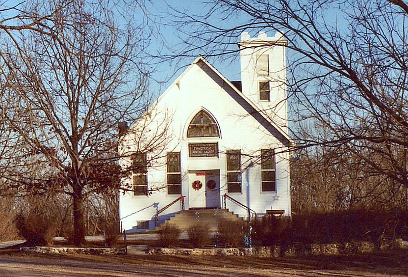 The present church building of the Moniteau Evangelical Advent Church opened in
1925. It features a castle-like turret and more than a dozen original stained-glass
windows.
