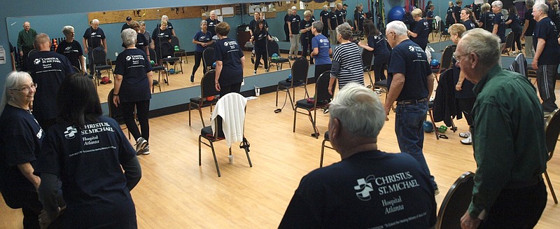 The Silver Sneakers, 24 strong at Atlanta's CHRISTUS St. Michael Heath and Fitness center, may look serious while working out, but in reality they are just waiting for someone to say something funny or make a strange move so that everyone will break out in noise.