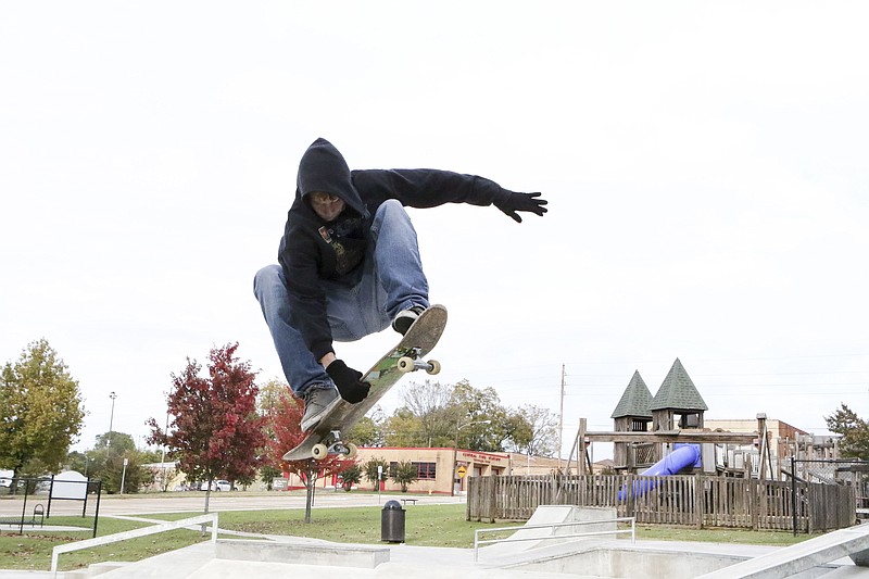 Rex Wayne Anderson launches into the air Tuesday to do an indy grab in downtown Texarkana, Texas. 