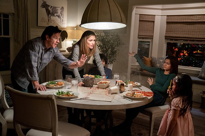 This image released by Paramount Pictures shows Mark Wahlberg, from left, Rose Byrne, Gustavo Quiroz, Isabela Moner, and Julianna Gamiz in a scene from "Instant Family." (Hopper Stone/Paramount Pictures via AP)