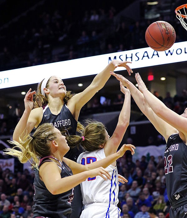 Strafford's Hayley Frank blocks a shot by California's Gracie George during last season's Class 3 state championship game at JQH Arena in Springfield. Frank signed Wednesday to play for the Missouri Tigers.