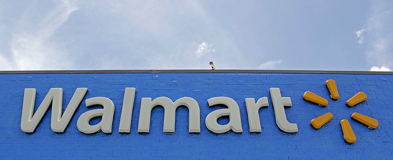 This June 1, 2017, file photo shows a Walmart store in Hialeah Gardens, Fla. Ford and Walmart are partnering to test a self-driving grocery delivery service. Ford will work with Walmart to determine what goods it can feasibly transport and figure out what issues may need to be addressed to successfully deliver orders via self-driving vehicles. (AP Photo/Alan Diaz, File)