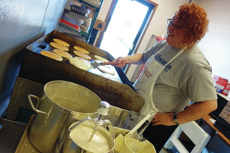 Members of Fulton's Kiwanis Club, including Rebecca Dunger Peak, use the funds raised on Friday's Pancake Day for their scholarship program.