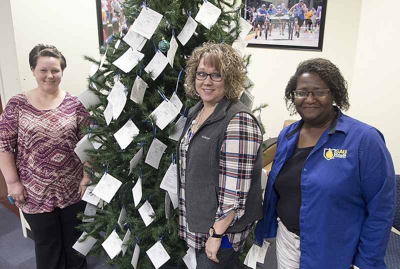 Sandra Martin, left, Jennifer Ford and Lillie Wright of Southern Arkansas University's Department of University Housing help lead the charge each year for the Columbia County Angel Tree. The program serves children in need from infancy through high school. (Submitted photo)
