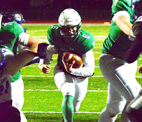Blair Oaks quarterback Nolan Hair runs up the middle for a touchdown during the first half of last Friday's Class 2 District 5 championship game against South Callaway at the Falcon Athletic Complex in Wardsville.