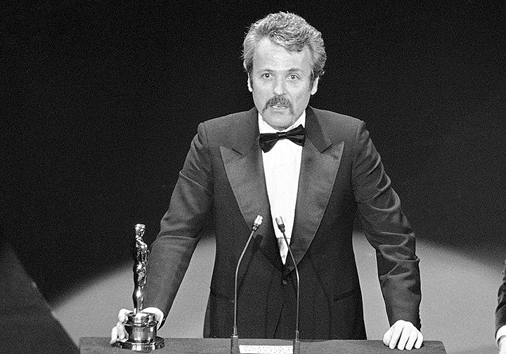 In this March 28, 1977 file photo, William Goldman accepts his Oscar at Academy Awards in Los Angeles, for screenplay from other medium for "All The President's Men." Goldman, the Oscar-winning screenplay writer of "Butch Cassidy and the Sundance Kid" and "All the President's Men" William Goldman died, Friday, Nov. 16, 2018. He was 87. (AP Photo, File)