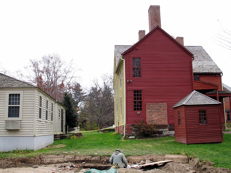 In this Thursday, Nov. 15, 2018, photo archaeologist Will Sikorski works at a dig site in Wethersfield, Conn. Experts have unearthed artifacts they believe date to the 1630s in Wethersfield, which has declared itself the state’s “most ancient town,” founded in 1634. But a few miles north, Windsor boasts it is the state’s “first town” settled in 1633. (AP Photo/Dave Collins)