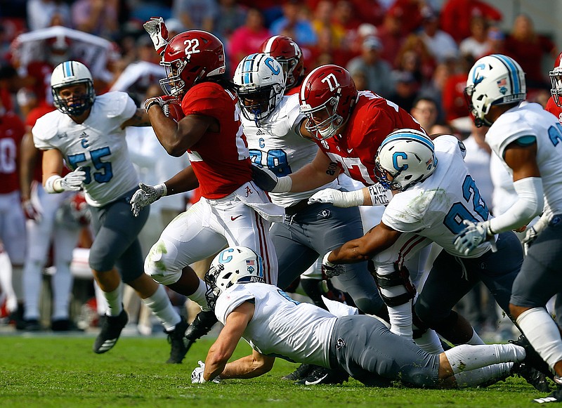 Alabama running back Najee Harris (22) carries the ball against Citadel during the second half of an NCAA college football game, Saturday, Nov. 17, 2018, in Tuscaloosa, Ala. (AP Photo/Butch Dill)