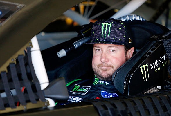 In this July 20 file photo, Kurt Busch waits in his car before NASCAR Cup Series practice at New Hampshire Motor Speedway in Loudon, N.H.