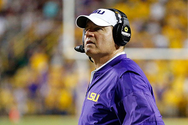 Former LSU coach Les Miles is in talks to become the new coach at Kansas.