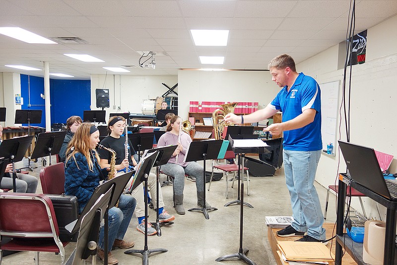 Band director Nathan Gargus teaches a new song to the seventh-grade Russellville band Nov. 16. Gargus has been Russellville's band director for four years