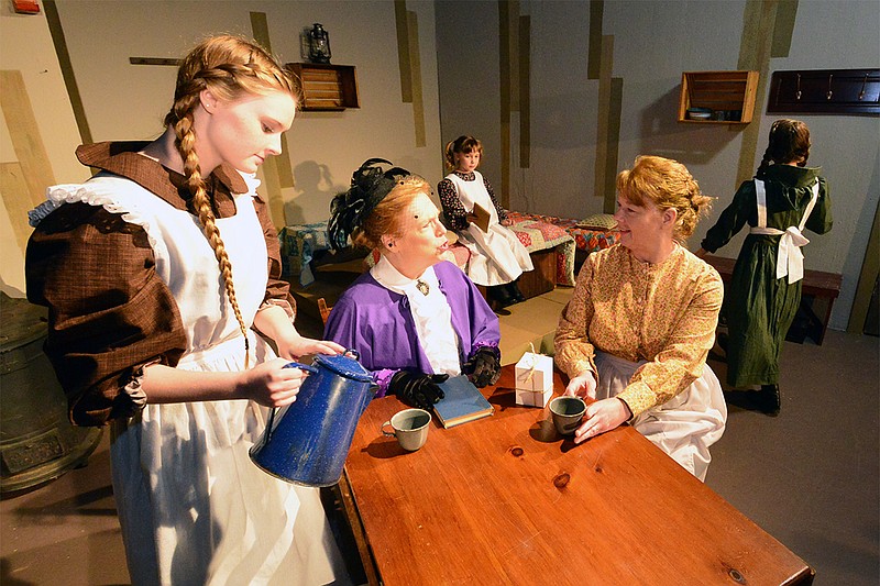 Actors Paige Bartow, Jeannie Ruth, Deann Martin and Maria Brown rehearse for "A Laura Ingalls Wilder Christmas" on Monday at the Stained Glass Theater. The show runs Nov. 29-Dec. 15. 