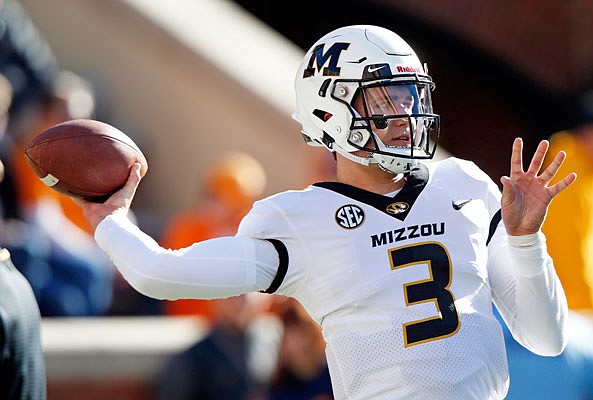 Missouri quarterback Drew Lock throws during warmups Nov. 17, 2018, before the game against Tennessee in Knoxville, Tenn.