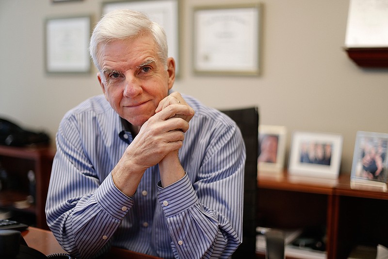 Attorney Mark Patterson poses in his law firm's offices in Nashville, Tenn. The recent turbulence in the U.S. stock markets is spooking older workers and retirees, a group that was hit particularly hard during the most recent financial crisis. "There's a huge fear of folks my age that they're going to run out of money and they're going to need to rely on the government for help," Patterson said.