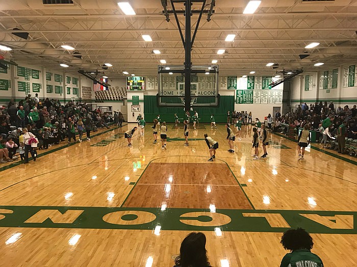 Blair Oaks and Helias players warm up in advance of their contest Tuesday, Nov. 20, 2018 in Wardsville, Mo.