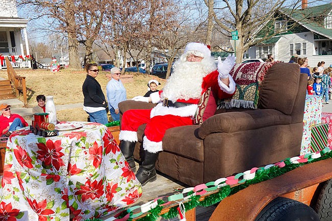 Santa had it easy in last year's Fulton Jaycees Christmas Parade with a comfy ride on a cushy sofa, cookies and milk at hand, and temperatures hovering near 70 degrees. The parade had plenty of spectators and their dogs receiving gifts of candy and canine treats strewn by participants.