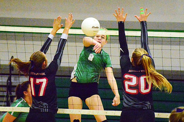 Blair Oaks senior middle hitter Lauren Casey (center) made the Class 3 all-state volleyball team, along with junior teammate Mariah Radmacher. The Lady Falcons finished the 2018 season with a 30-3-2 record.