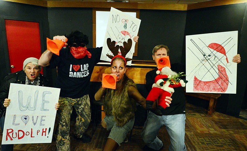 From left, Mary Jo LaCorte, Chris Kennison, Megan Sappington and Doug Richardson show their stances during reindeer Blitzen's monologue, which Sappington delivers during the upcoming Scene One Theatre presentation of "The Eight Reindeer Monologues" Nov. 29-Dec. 1, 2018.