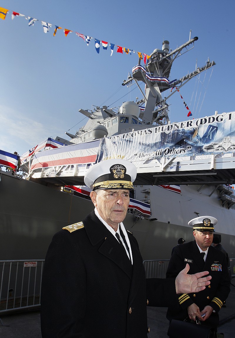 Vice Chief of Naval Operations, Admiral William Moran describes the function of the USS Thomas Hudner prior to its commissioning ceremony Saturday Dec. 1, 2018, in Boston.  The Maine-built Arleigh Burke-class destroyer is named in honor of Thomas Hudner, a Fall River native and longtime Concord resident who was awarded the Medal of Honor by President Harry Truman for crash-landing his plane to try to save the life of Ensign Jesse Brown during the Battle of Chosin Reservoir in December 1950.  (Paul Connors/The Boston Herald via AP)