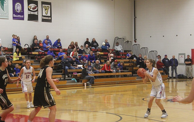 Maura Pardoe launches a three pointer during California's 72-13 win over Versailles in the first round of the Tri County Tournament, Nov. 27, 2018.