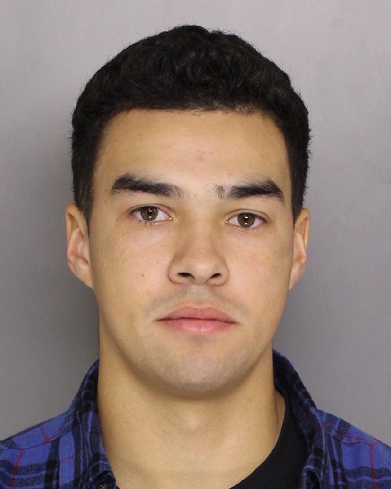 This image released by the Baltimore County Police shows Fynn Arthur. Baltimore County police on Monday, Dec. 3, 2018, filed hate crime charges against 21-year-old Fynn Arthur, a Brunswick, Maine, resident who was enrolled as a student at Goucher College in Towson, Md. Police arrested Arthur on Thursday, Nov. 28, on charges of malicious destruction of property. (Baltimore County Police via AP)