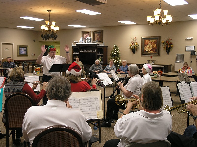 <p>Democrat photo/Danisha Hogue</p><p>The California Community Ensemble is led by interm director Jacob Hampton at the Christmas sing-a-long Nov. 29 at California Care Center.</p>