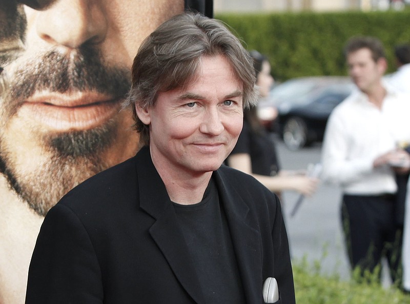FILE - In this April 20, 2009 file photo, Esa-Pekka Salonen arrives at the premiere of "The Soloist" in Los Angeles. Salonen will become music director of the San Francisco Symphony starting with the 2020-21 season. He will succeed Michael Tilson Thomas, who ends his 25-year tenure following the 2019-20 season. (AP Photo/Matt Sayles, File)