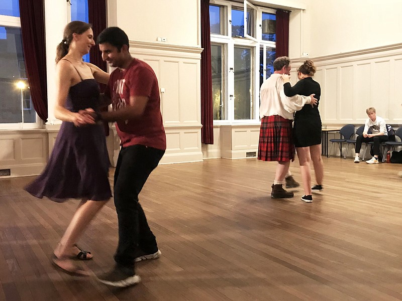 Even someone without experience can participate in a Scottish ceilidh, because a member of the band explains how to do each dance before the music begins. (Photo for The Washington Post by Emily Gillespie)
