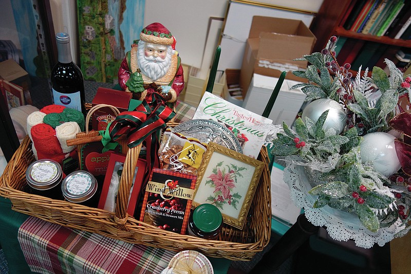 <p>Jenny Gray/FULTON SUN</p><p>The drawing for the Kingdom of Callaway Historical Society Christmas basket will be noon Dec. 15. This year’s basket is valued at more than $200 and includes a ham, pecans, hand towels, blackberry and peach jams, wine and more. Tickets at the Court Street museum are $2 each, or save on multiples.</p>