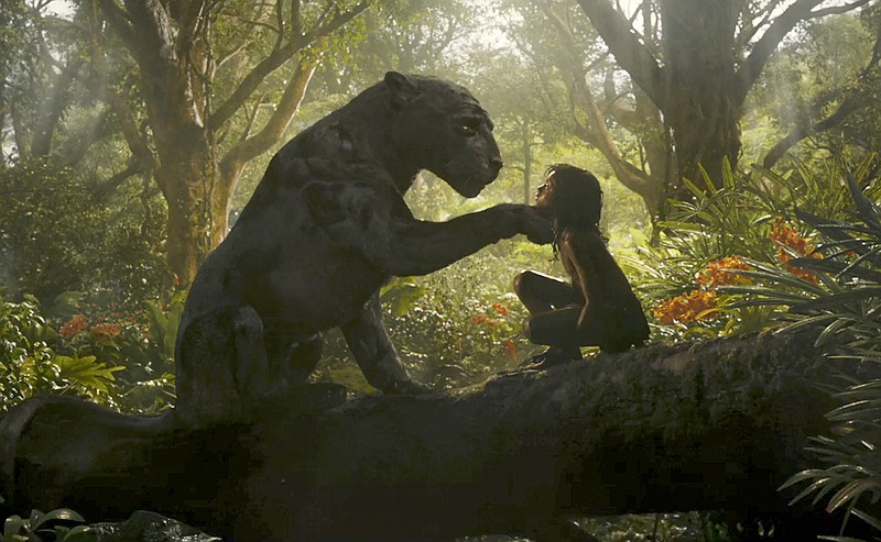 In "Mowgli," Rohan Chand plays the title character, an orphaned Indian boy who is rescued by the panther Bagheera (voice of Christian Bale) after his parents are killed. (Netflix-Warner Bros. Pictures)