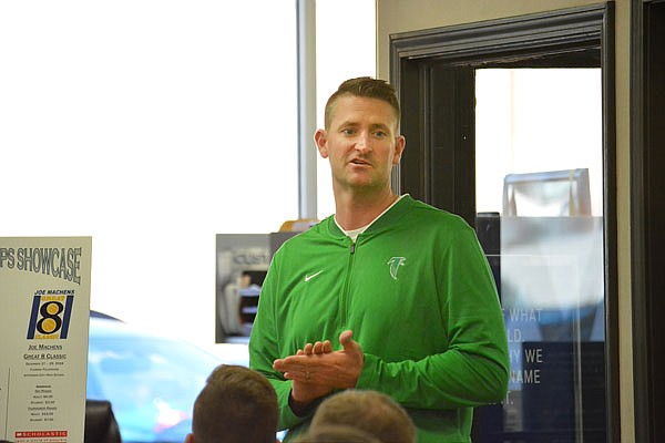 Blair Oaks boys basketball coach Ryan Fick speaks about his team during Wednesday's press conference for the Great 8 Classic at Joe Machens Ford.