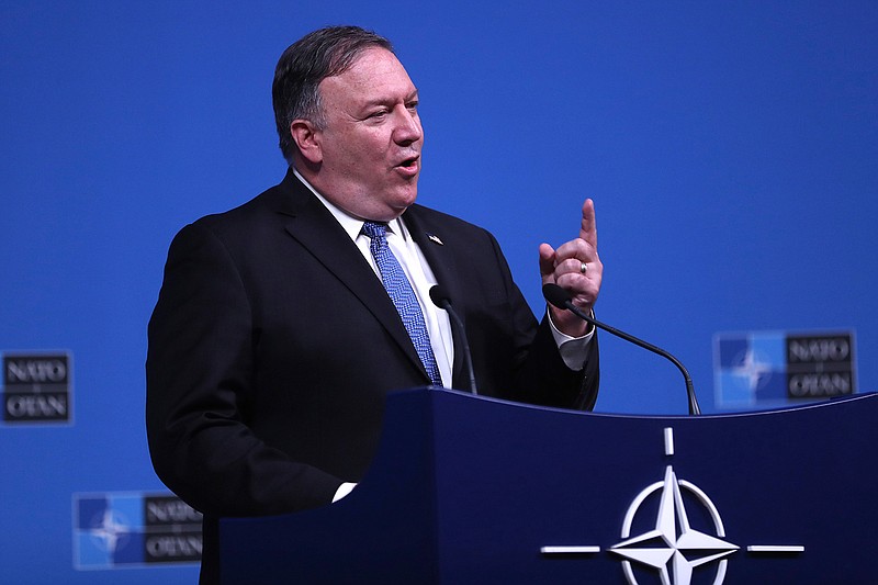 U.S. Secretary of State Mike Pompeo speaks during a media conference after a meeting of NATO foreign ministers at NATO headquarters in Brussels, Tuesday, Dec. 4, 2018. (AP Photo/Francisco Seco)