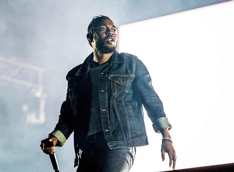 FILE - In this July 7, 2017, file photo, Kendrick Lamar performs during the Festival d'ete de Quebec in Quebec City, Canada. A list of nominees in the top categories at the 2019 Grammys, including Lamar, who is the leader with eight nominations, were announced Friday, Dec. 7, 2018, by the Recording Academy. Drake, Cardi B, Brandi Carlile, Childish Gambino, H.E.R., Lady Gaga, Maren Morris, SZA, Kacey Musgraves and Greta Van Fleet also scored multiple nominations. (Photo by Amy Harris/Invision/AP, File)