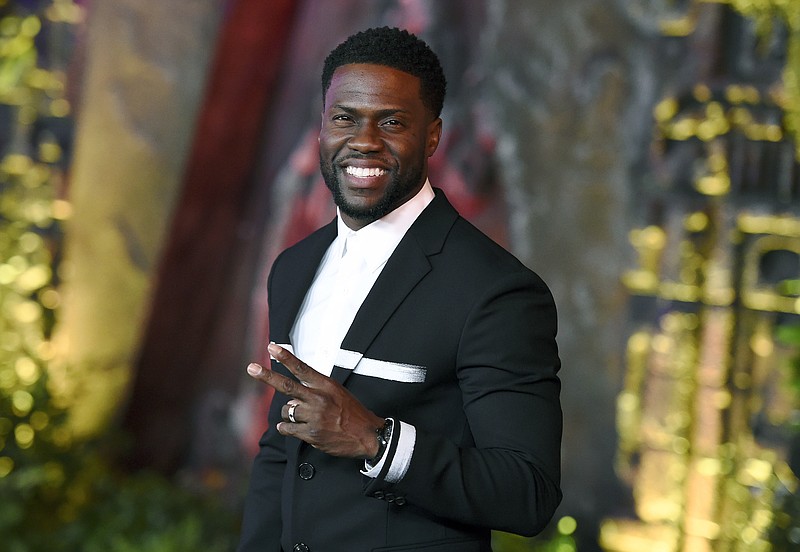 FILE - In this Dec. 11, 2017 file photo, Kevin Hart arrives at the Los Angeles premiere of "Jumanji: Welcome to the Jungle" in Los Angeles. (Photo by Jordan Strauss/Invision/AP, File)