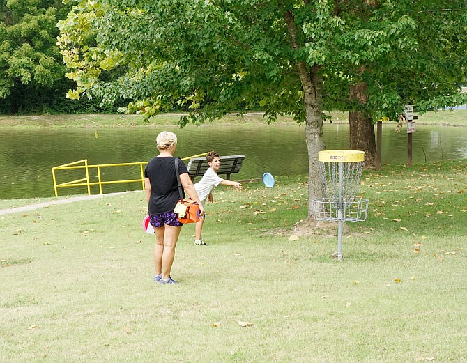 Princeton Miller, 11, participated in his first disc golf tournament last summer at Veterans Park in Fulton with the support of his mother, Theresa. The state is opening applications for parks grants to cities, counties, and schools for public recreation. The closing date is Feb. 15.