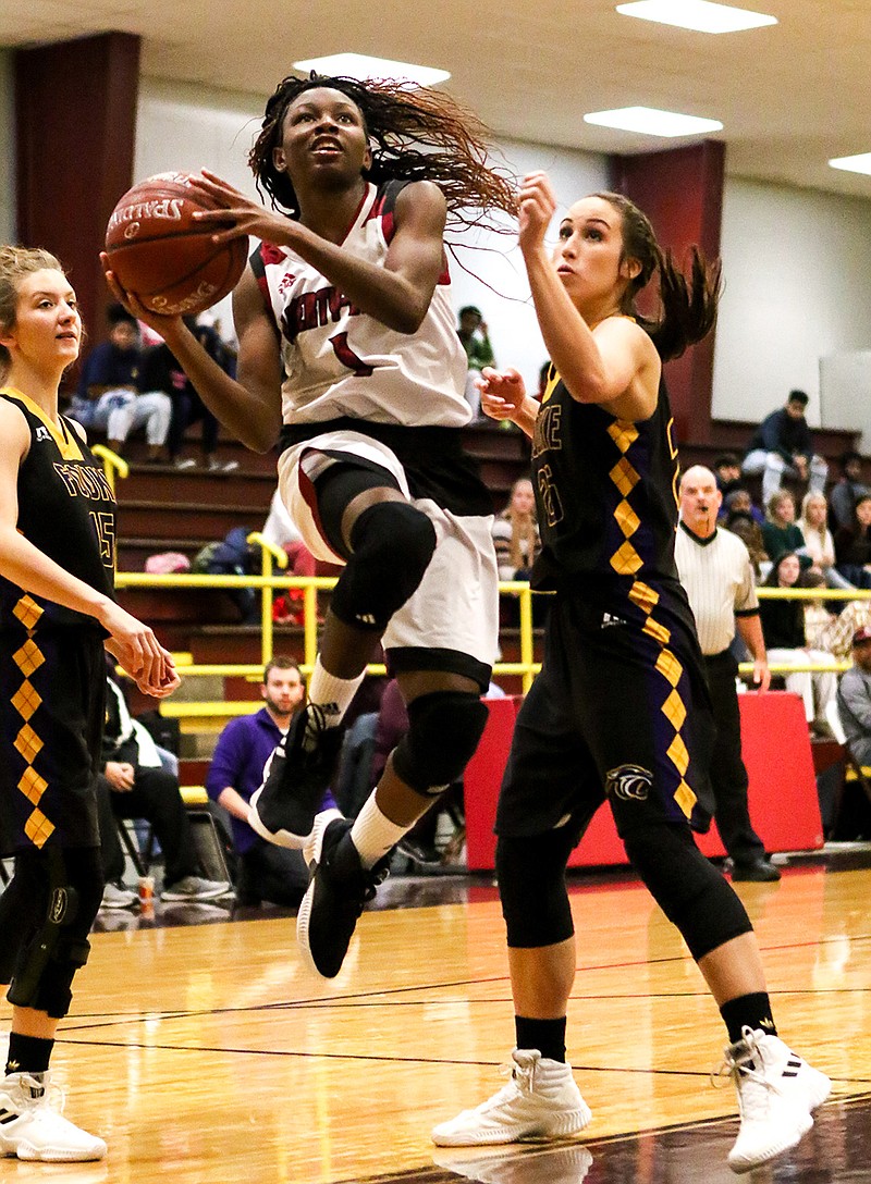 Liberty-Eylau's Eliyah Howard heads for the basket in a successful layup against Fouke on Thursday during the first day of the Gunslinger Shootout at New Boston High School. 