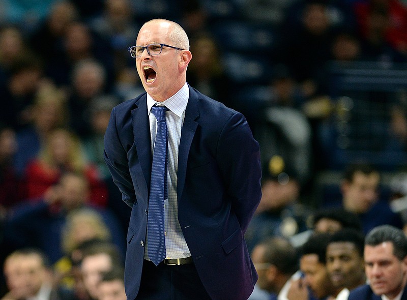 UConn head coach Dan Hurley yells from the sideline during the second half of an NCAA college basketball game against UMass-Lowell, Tuesday, Nov. 27, 2018, in Storrs, Conn. (AP Photo/Stephen Dunn)