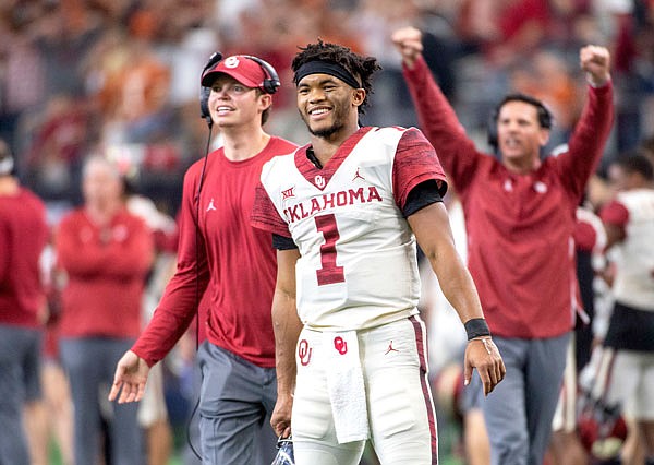 Oklahoma quarterback Kyler Murray celebrates on the sidelines after throwing a touchdown against Texas during the second half of the Big 12 Conference championship game last Saturday in Arlington, Texas.