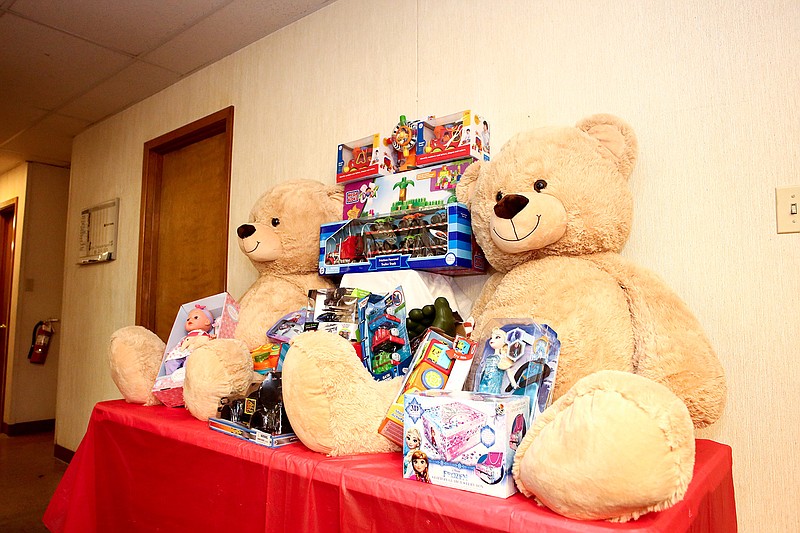 Toys sit on a table at the entrance of the Domestic Violence Protection building on Friday in Texarkana, Texas.