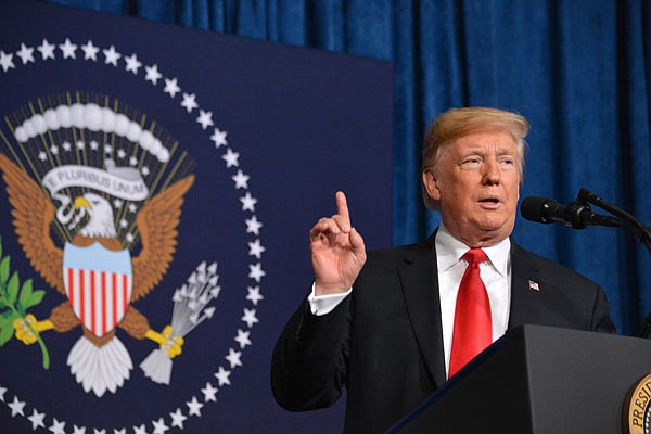 President Donald Trump speaks to law enforcement from around the country Friday during the Project Safe Neighborhood Conference at Westin Crown Center in Kansas City. The president praised law enforcement for their work in neighborhood security and the decrease in crime while he also spoke on the topic of border security. 
