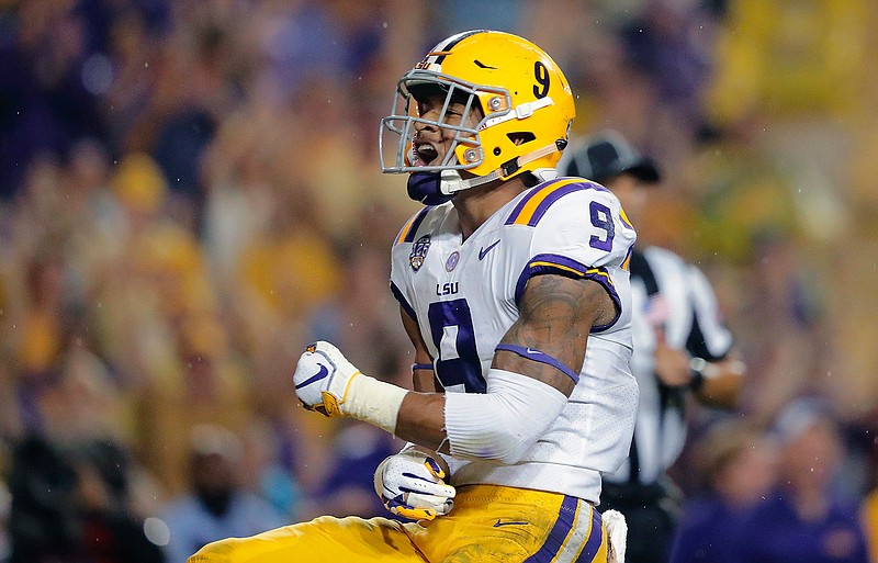 LSU safety Grant Delpit celebrates his sack of Mississippi quarterback Jordan Ta'amu Sept. 29 in Baton Rouge, La. Delpit on Monday was named to the 2018 AP All-America first team.