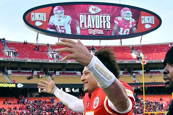 Chiefs quarterback Patrick Mahomes celebrates as he walks off the field after Sunday's overtime win against the Ravens at Arrowhead Stadium.