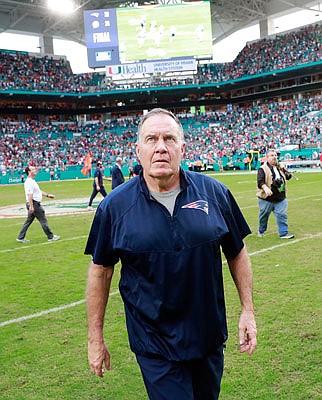 Patriots coach Bill Belichick walks off the field after Sunday's loss to the Dolphins in Miami Gardens, Fla.