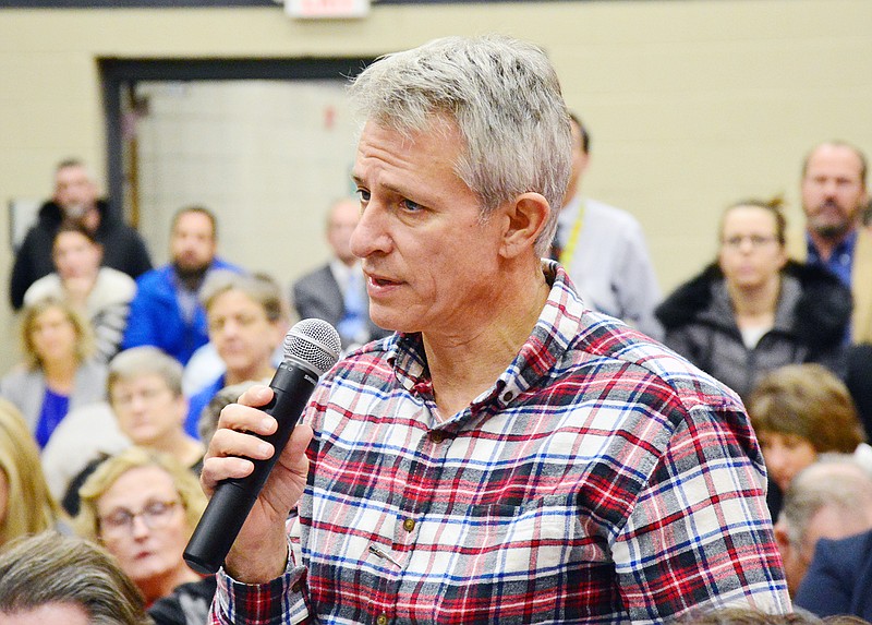 Audience member Dwain Roberts speaks during a public forum with UM Health and SSM Health on the proposed sale of St. Mary's on Monday at the Special Olympics Training for Life campus.