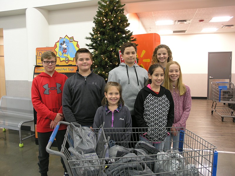 <p>Democrat photo/Danisha Hogue</p><p>Members of the California Show Me 4H shopped for two Angel Tree children Dec. 2</p>