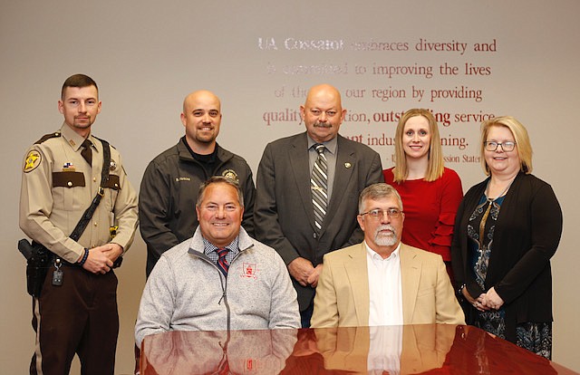 University of Arkansas Cossatot will offer a Criminal Justice Technical Certificate next semester. Front row, from left, UA Cossatot Chancellor Dr. Steve Cole and Sevier County Sheriff Robert Gentry; second row, from left, Sevier County Sheriff's Office Sgt. Greg Davignon, Sevier County criminal investigator Brian Hankins, Sevier County jail administrator Chris Wolcott, UA Cossatot Vice Chancellor of Academics Ashley Aylett and UA Cossatot Division Chair of Professional Studies Barbara Lacefield. (Submitted photo)
