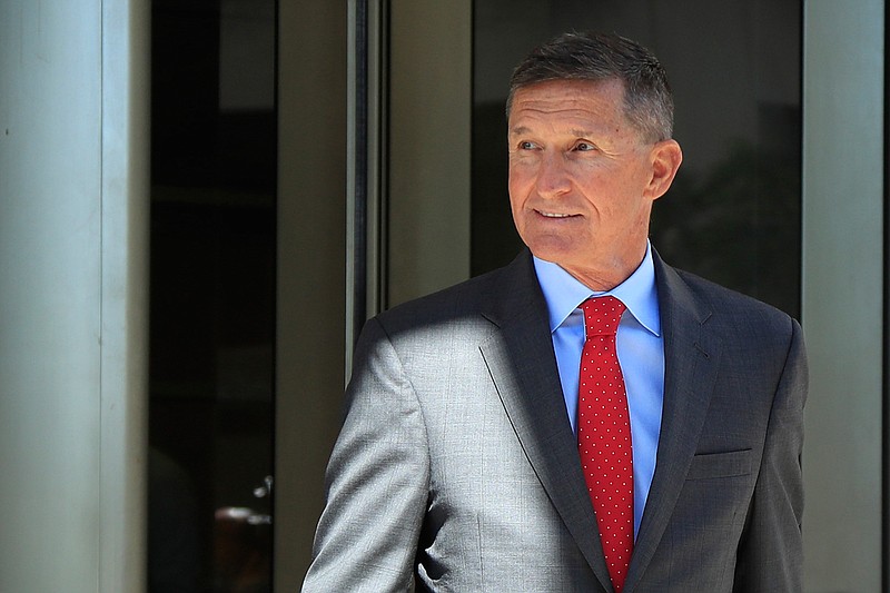 In this July 10, 2018 file photo, former Trump national security adviser Michael Flynn leaves federal courthouse in Washington, following a status hearing. (AP Photo/Manuel Balce Ceneta)